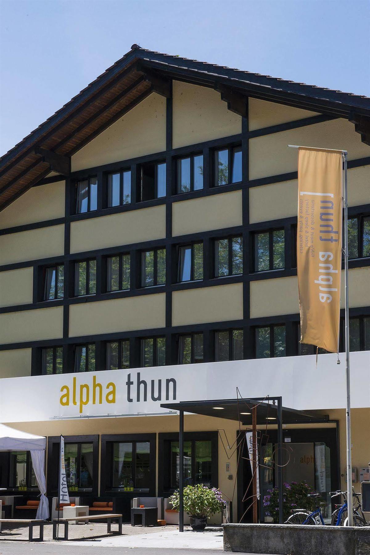 Hotel Alpha Thun Bagian luar foto